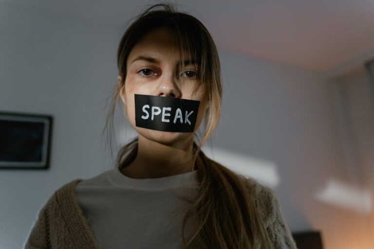 woman with tape on her mouth