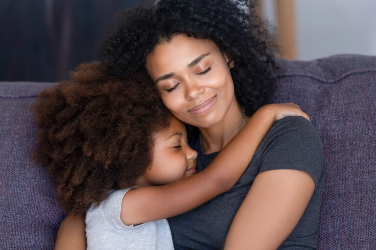 mother and daughter hugging