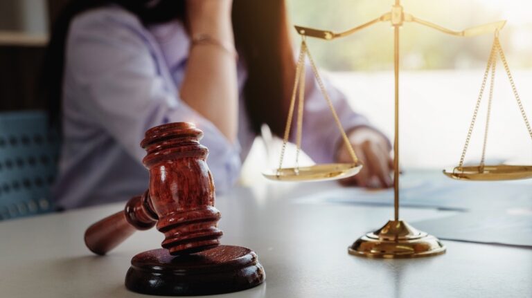 female lawyer talking on the phone with a client