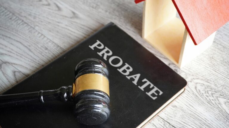 Toy house, gavel and text probate